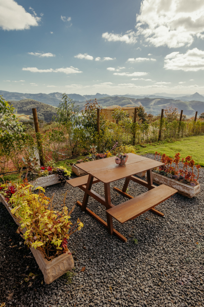 airbnb outdoor lounge area with table and beautiful view