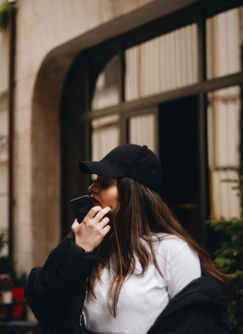 woman with headphones and phone