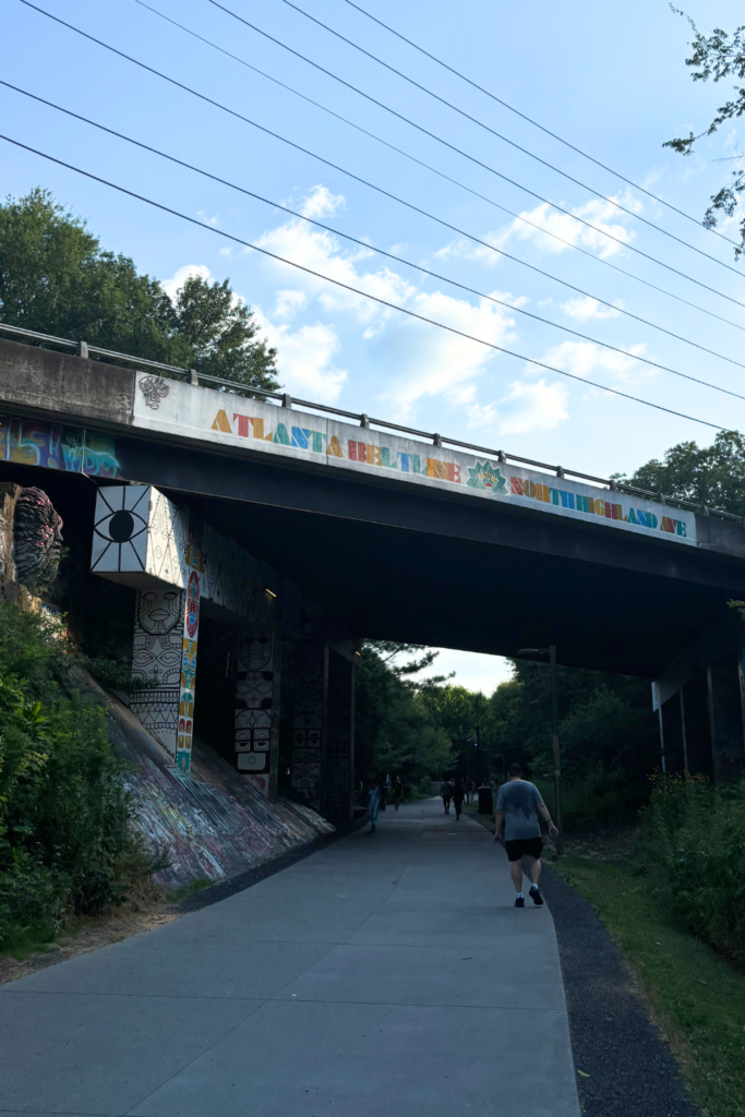 Image of the BeltLine going through Old Fourth Ward Atlanta Georgia. The overpass is painted with colorful graffiti