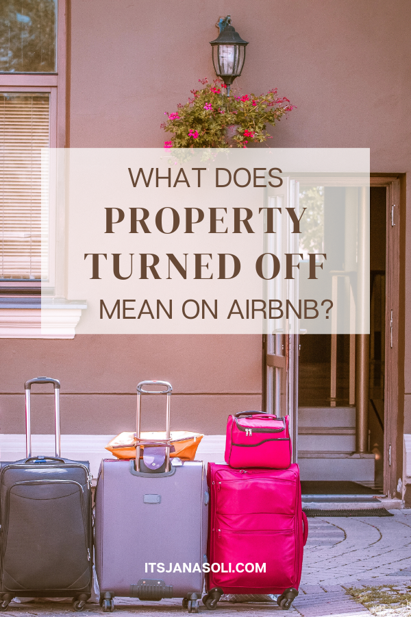 Three suitcases lined up in front of the front door of an Airbnb on a sunny day.