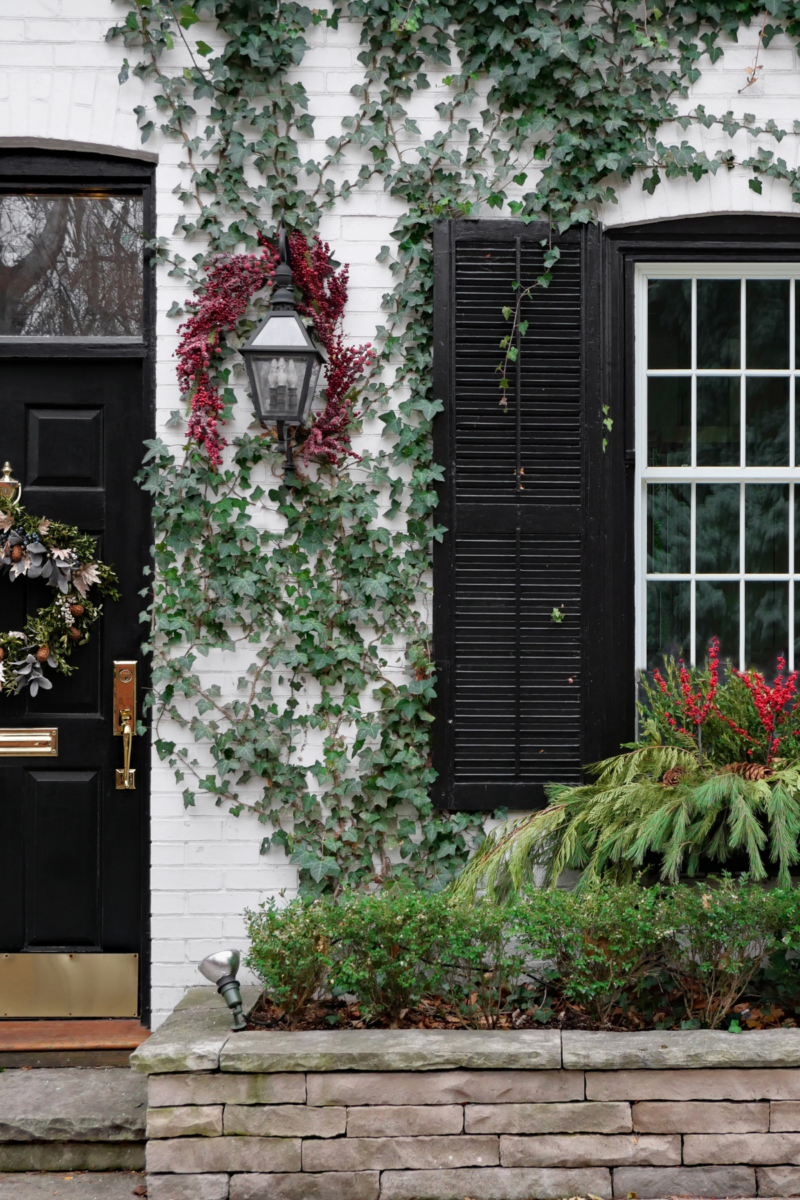 Front door of historic home decorated for Christmas in Charleston SC.