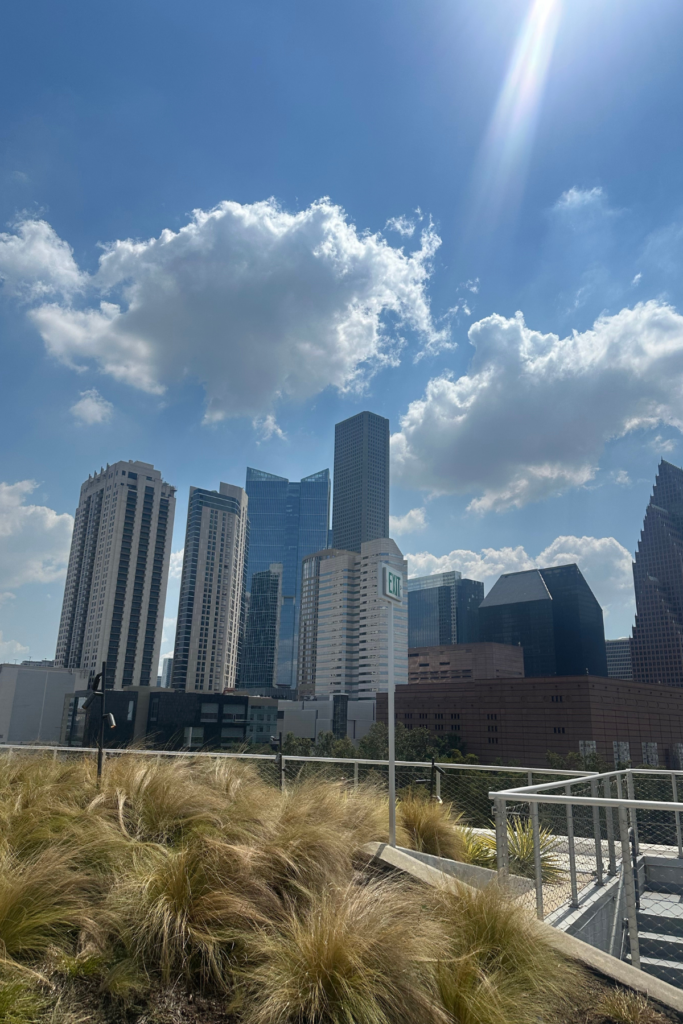 Downtown Houston Texas during the daytime with blue sky. Part of the article about traveling from Atlanta to Houston by plane.