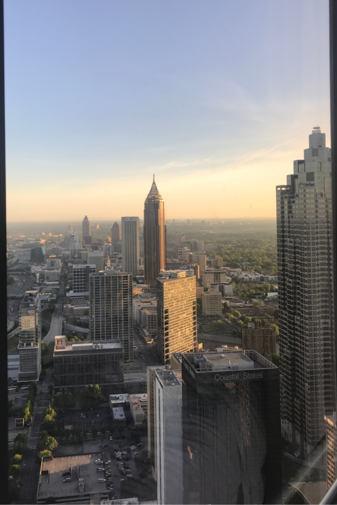 Downtown Atlanta Georgia shown from a skyscraper at sunset.