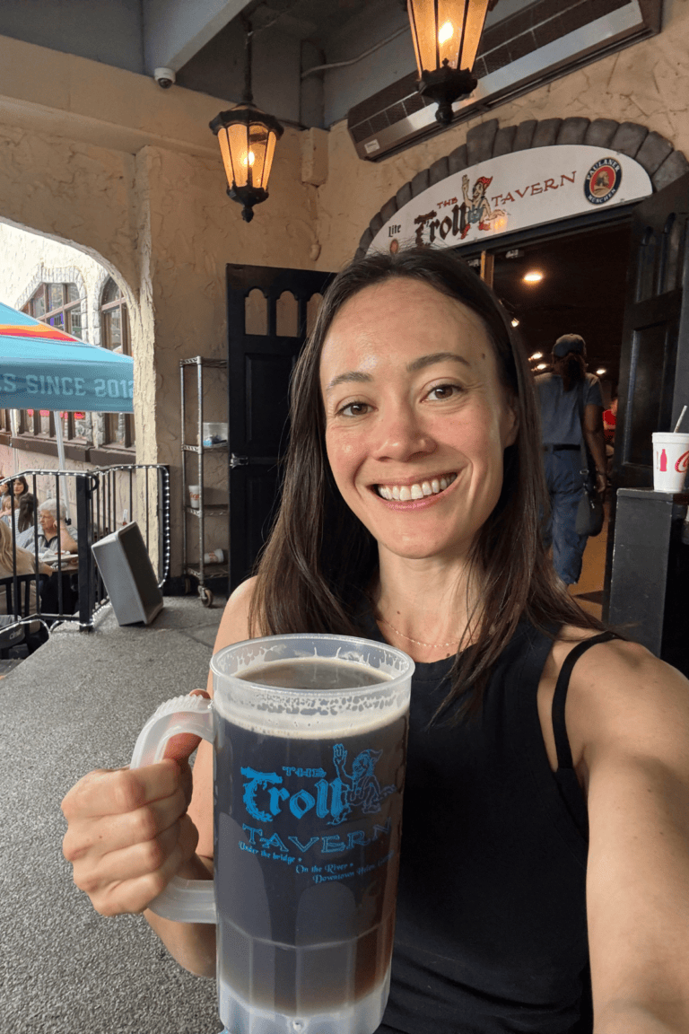woman holding beer stein